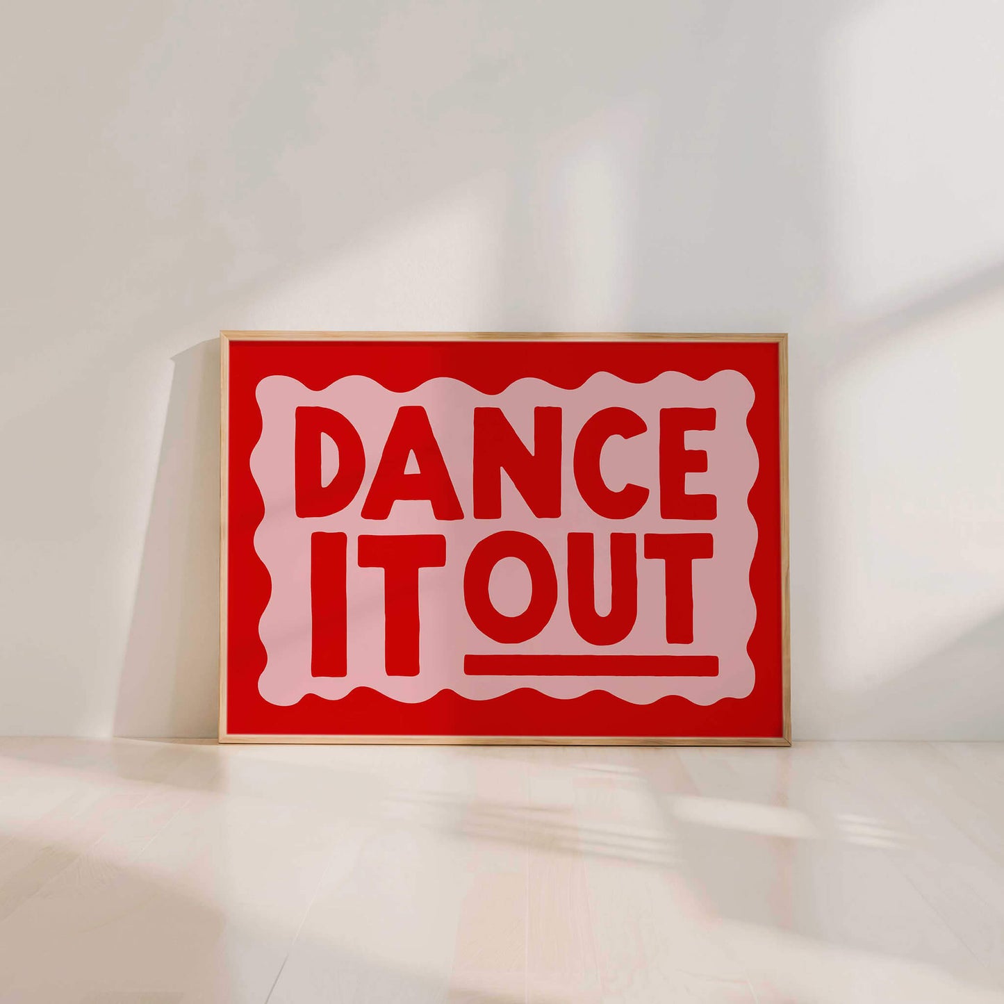 A large red sign with the text "DANCE IT OUT" in bold white letters.
