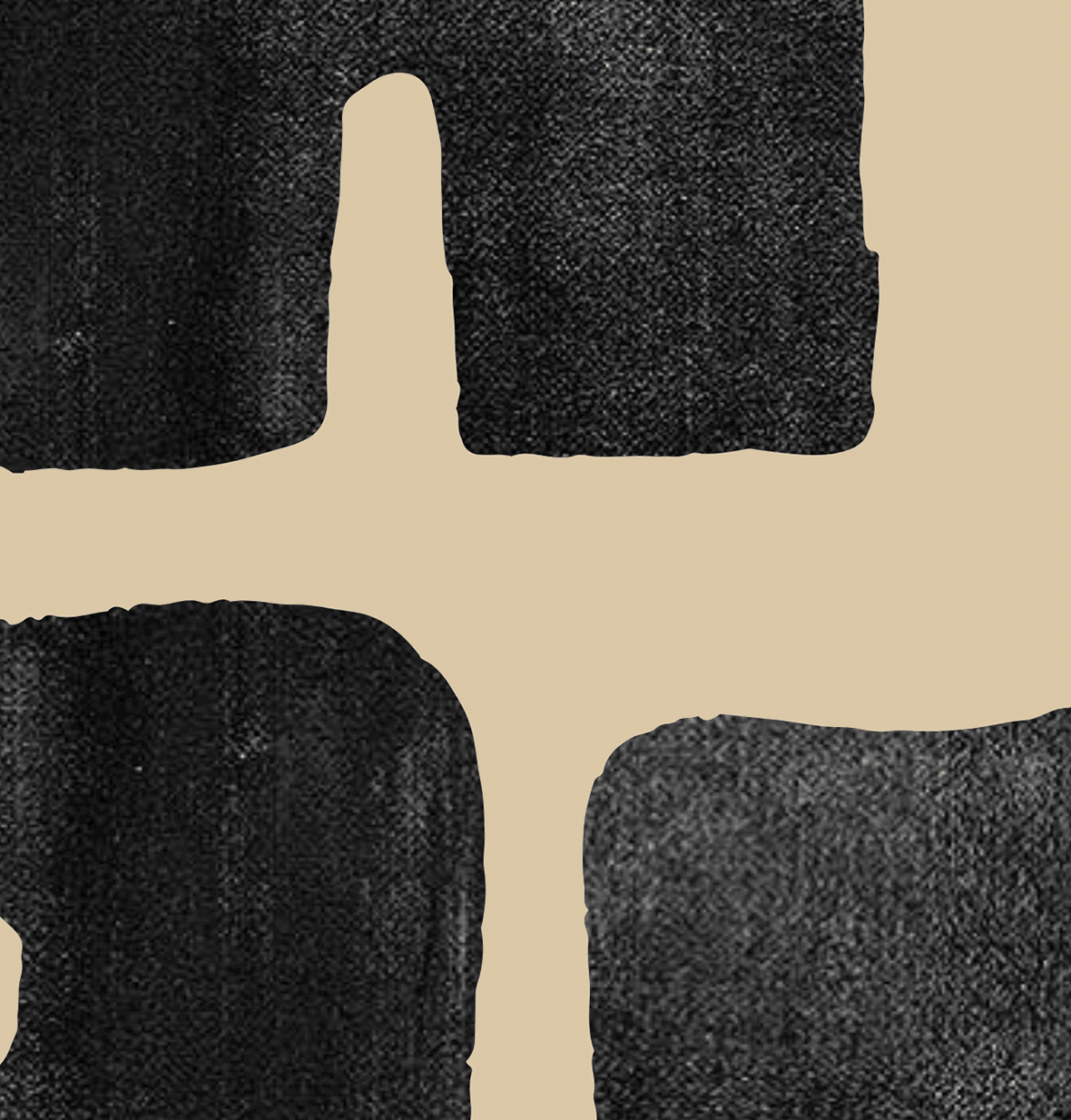 Close-up of black textured car mats on a beige background